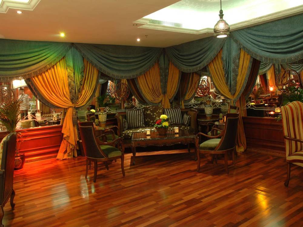 Отель Al Shohada By Palm Rich Makkah Мекка Экстерьер фото The interior of the restaurant
