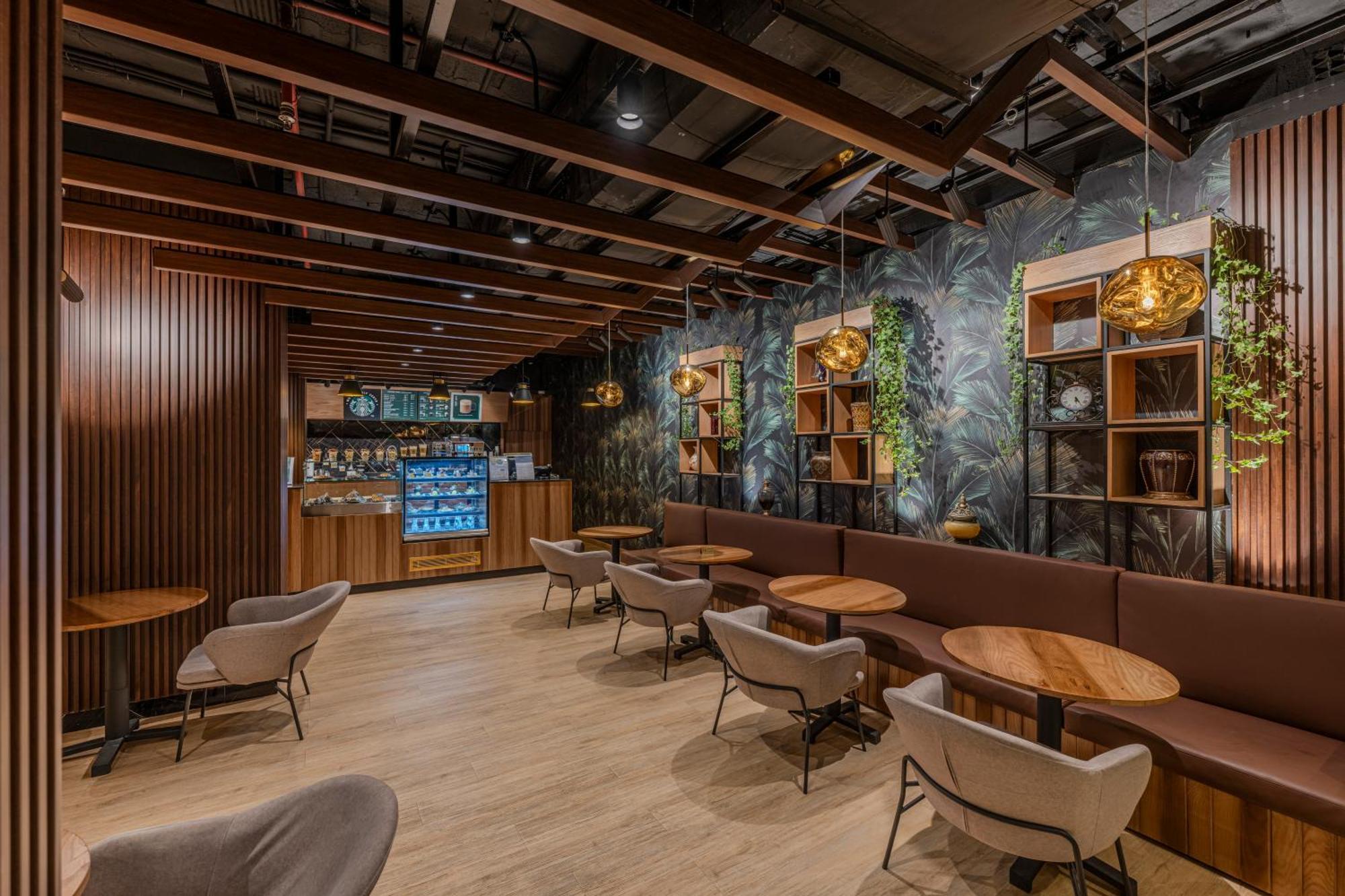 Отель Al Shohada By Palm Rich Makkah Мекка Экстерьер фото Interior of a Starbucks Reserve store in Shanghai, China