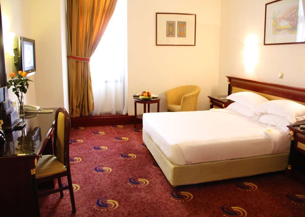 Отель Al Shohada By Palm Rich Makkah Мекка Номер фото A room at the hotel