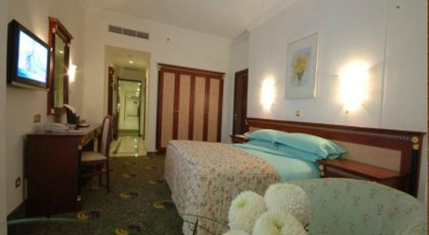 Отель Al Shohada By Palm Rich Makkah Мекка Экстерьер фото A room at the hotel